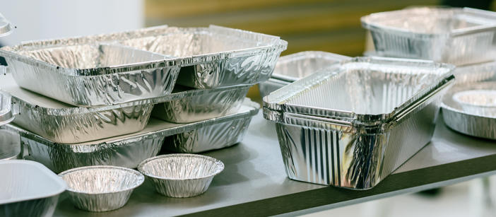 Collection of several differently-shaped food packages made of aluminium.