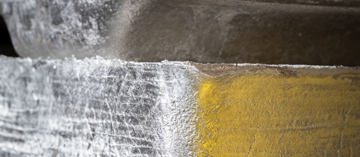Aluminium ingots stacked on top of each other.