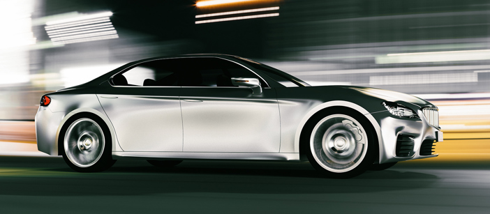 The aluminium hull of a driving car in motion.