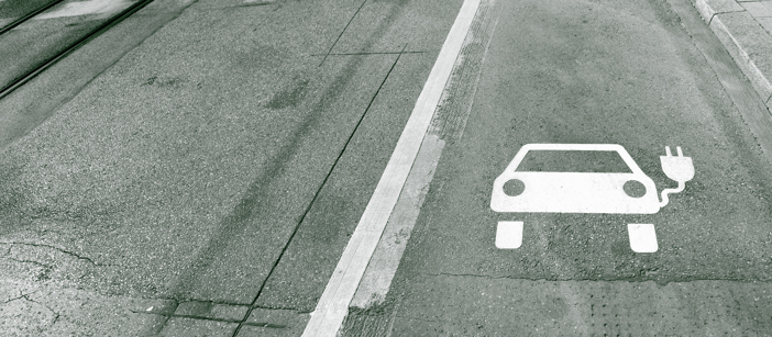Road marking of a pictogram for an electric car.